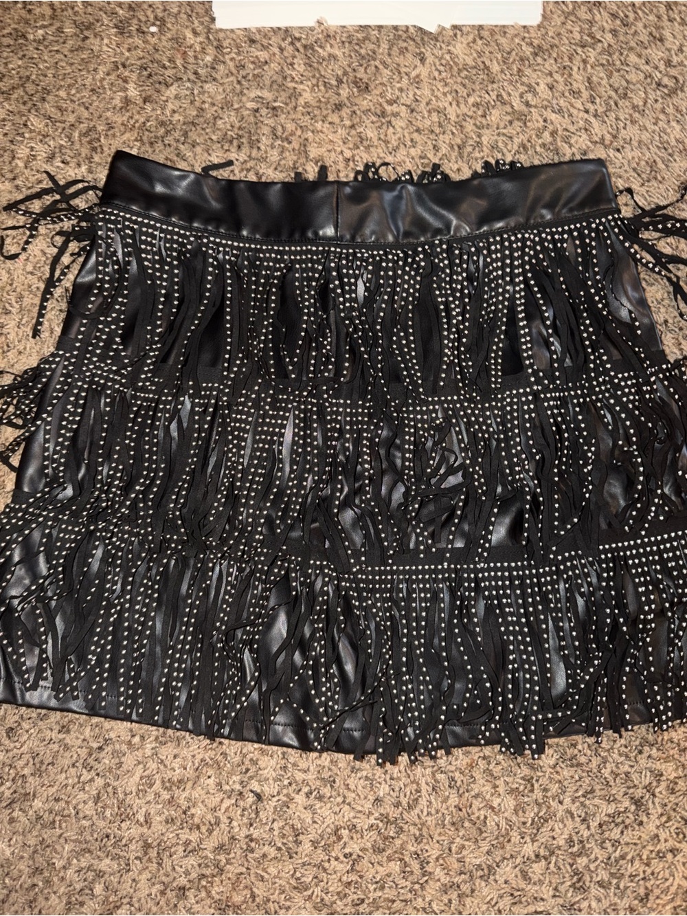 eesome Black Faux Leather Fringe Mini Skirt with Stud Embellishments